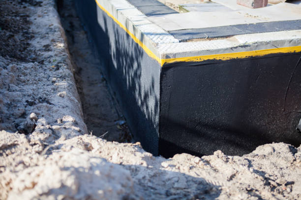 Professional Exterior Waterproofing technician working in New Plymouth, OH